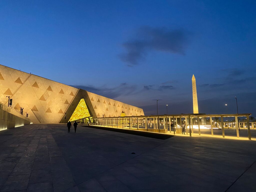 Primary facade Grand Egyptian Museum at night. Image © Lina Shaker