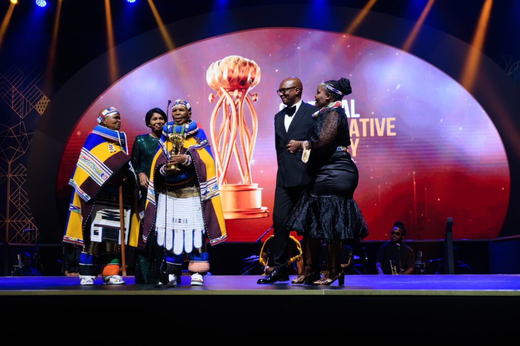 BMW Group South Africa presents Lifetime Achievement Award to Dr. Esther Mahlangu at South African Creative Arts Awards.